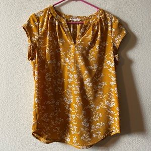 White and mustard floral print top